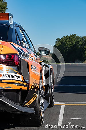 Rear view of racing car in racetrack starting grid pole position Editorial Stock Photo