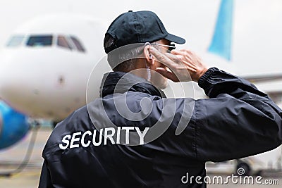 Rear View Of A Security Guard Stock Photo