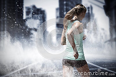 Composite image of rear view of sportswoman running on a white background Stock Photo