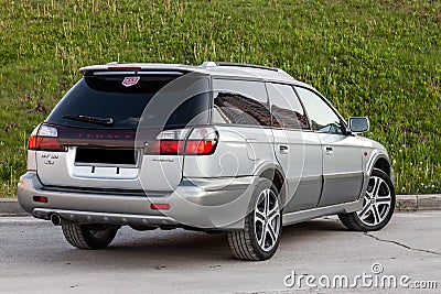 Rear View of Subaru Legacy Lancaster japanese car in beige color on the parking Editorial Stock Photo