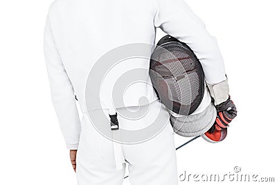 Rear view of swordsman holding fencing mask and sword Stock Photo