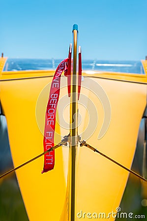 Rear view, tail rudder and red gust lock of small prop airplane. Stock Photo