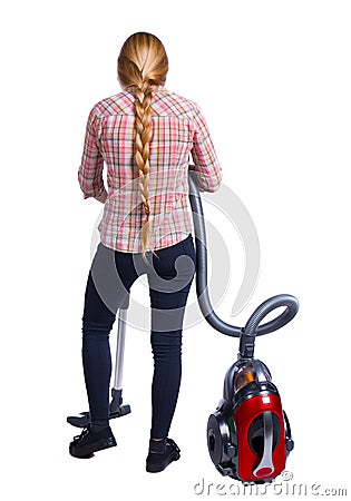 Rear view of a woman with a vacuum cleaner. Rear view of a woman with a vacuum cleaner. Stock Photo