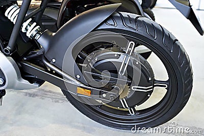 Rear wheel electric motorcycle with engine inside Stock Photo