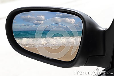 Rearview car mirror tropical caribbean beach Stock Photo