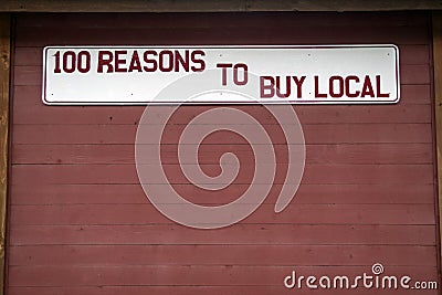 100 Reasons To Buy Local Sign Stock Photo