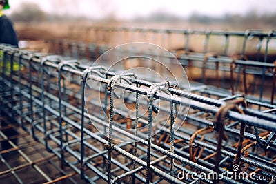 Rebar steel bars, reinforcement concrete bars with wire rod used in foundation of construction site Stock Photo