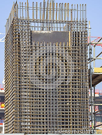 Rebars bars for concrete wall construction of a new building. Construction site. Iron structure ready to be cast with concrete Stock Photo