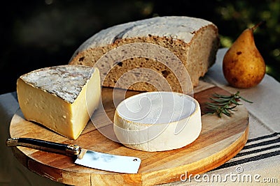 Reblochon Tomme de Savoie French cheese Savoy french Alps France Stock Photo