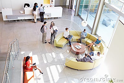 Reception Area Of Modern Office Building With People Editorial Stock Photo