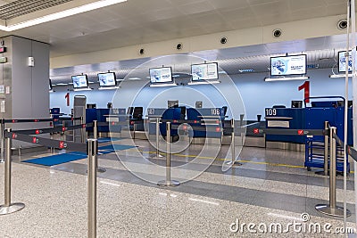 Reception counters flying away in the flight check-in lounge at the Nikola Tesla International Airport near the city of Belgrade i Editorial Stock Photo