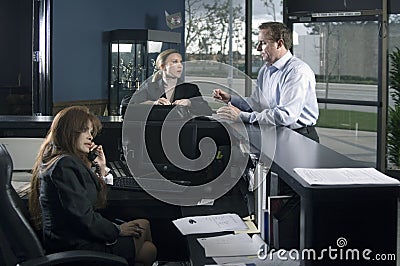 At the reception desk Stock Photo