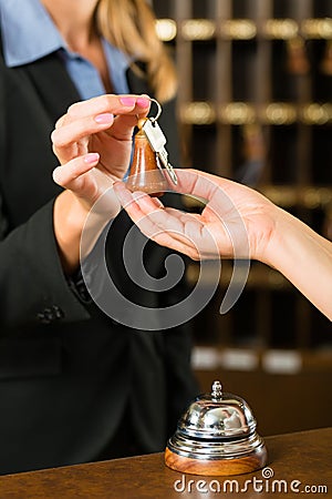 Reception - Guest checking in a hotel Stock Photo