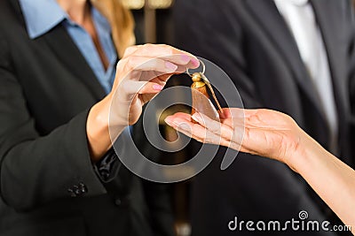 Reception - Guest checking in a hotel Stock Photo