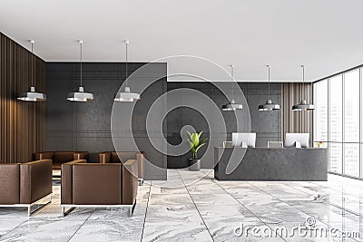Reception hall with armchairs and desk with computers, grey and tiled design Stock Photo