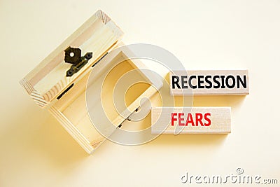 Recession fears symbol. Concept words Recession fears on wooden blocks on a beautiful white table white background. Empty wooden Stock Photo
