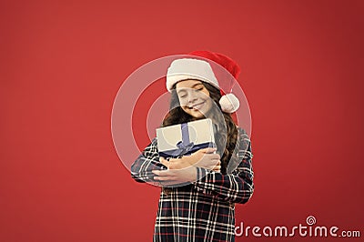 Recieving present. Gifts delivery service. Emotional baby. Little girl hold gift box. Winter holidays. Merry christmas Stock Photo