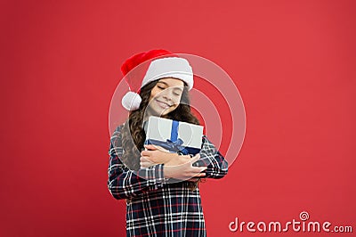 Recieving present. Gifts delivery service. Emotional baby. Little girl hold gift box. Winter holidays. Merry christmas Stock Photo