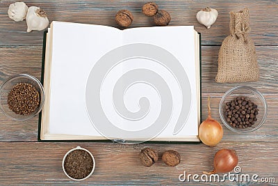 Recipe cook blank book on wooden background, spoon, rolling pin, checkered tablecloth Stock Photo