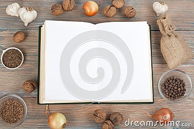 Recipe cook blank book on wooden background, spoon, rolling pin, checkered tablecloth Stock Photo