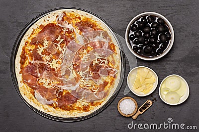 Recipe of pizza capriciosa on grey stone Stock Photo