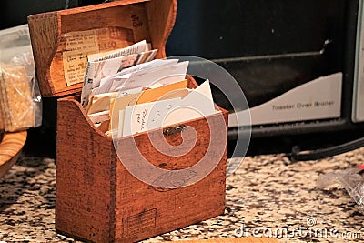 Recipes in old fashioned wooden storage box Stock Photo