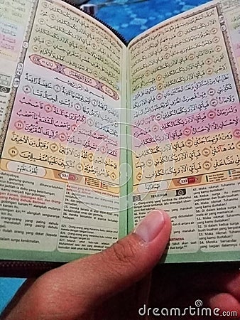 Reciting Al-Qur'an As a guide for the Muslim ummah Stock Photo