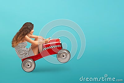 Reckless girl is driving very fast the car Stock Photo