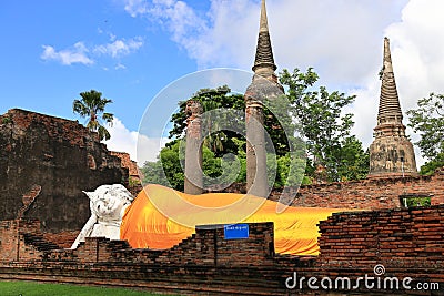 The Reclining Buddha in antique ruins building and Ancient antiquity architecture of old capital of thailand Stock Photo