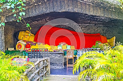 Reclining Buddha in Cave Editorial Stock Photo