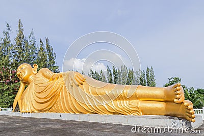 Reclining Buddha gold statue at Phuket, Thailand Stock Photo