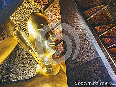 Wat Pho Sleeping buddha gold statue Bangkok Landmark Thailand tourism Stock Photo