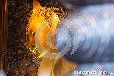 Reclining Buddha gold statue in Wat Phra Chettuphon Wimon Mangkhalaram Wat pho Stock Photo