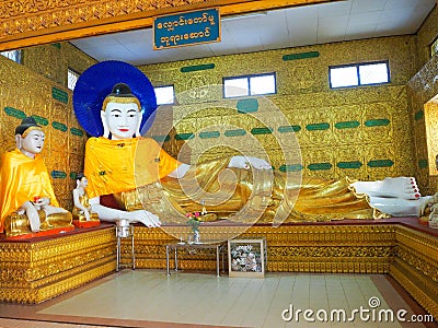 reclining Buddha staclining Buddha image at Kyikpawlaw Pagoda, Kyaikhto, Myanmar Editorial Stock Photo