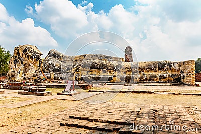 Reclining Buddha at Wat Lokayasutharam in Ayutthaya, Thailand Stock Photo