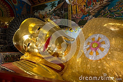 Reclining Golden Buddha at Wat Phra Pan (Wat Phranon Mae Pukha Stock Photo