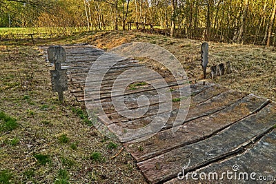 Reconstruction of an Iron Age boardwalk with ritual figures Stock Photo