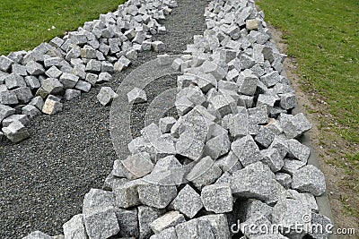 Reconstruction of a pack sidewalk with cobbles Stock Photo