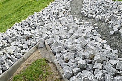 Reconstruction of a pack sidewalk with cobbles Stock Photo