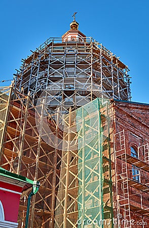 Reconstruction process of the orthodox cathedral using scaffolding Stock Photo