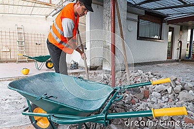 Reconstruction of waterproofing and insulation of a roof - terrace. Phase of excavation and preparation of the fund Editorial Stock Photo