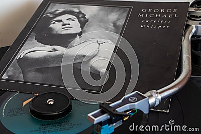 Record player with vinyls in the foreground. Editorial Stock Photo