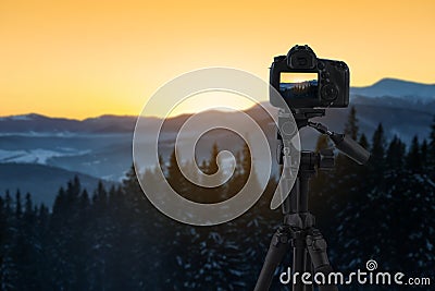 Recording beautiful view of mountain landscape on video camera Stock Photo