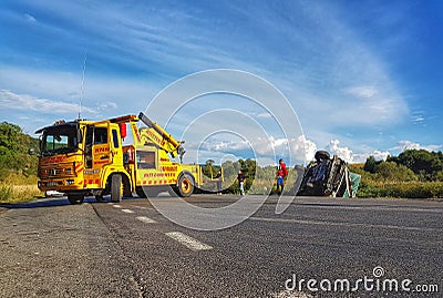 Recovery truck helps a Van on important european road Editorial Stock Photo