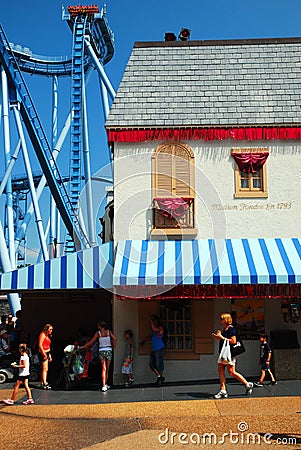 A recreated French chateau and a roller coaster Editorial Stock Photo