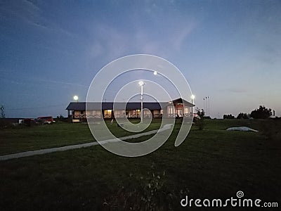 recreation center in the summer. Sapboard, river and reeds, sunset or sunrise. Stock Photo