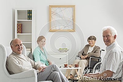 Recreation room with seniors Stock Photo