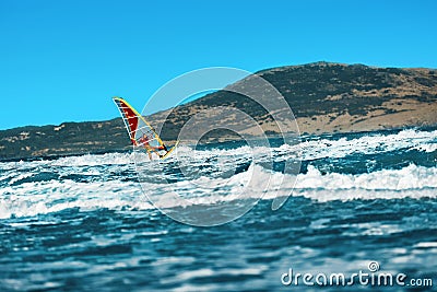 Recreational Extreme Water Sports. Windsurfing. Surfing Wind Act Stock Photo