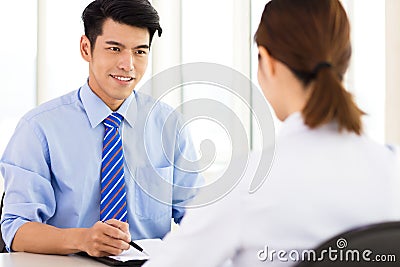 Recruiter checking the candidate during job interview Stock Photo