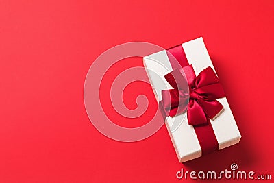 Rectangular gift box on red background with copy of space Stock Photo